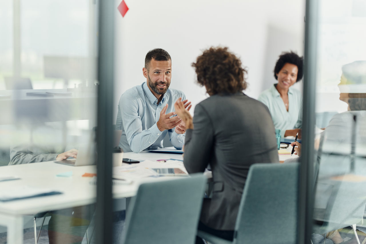 Business colleagues meet to discuss current projects