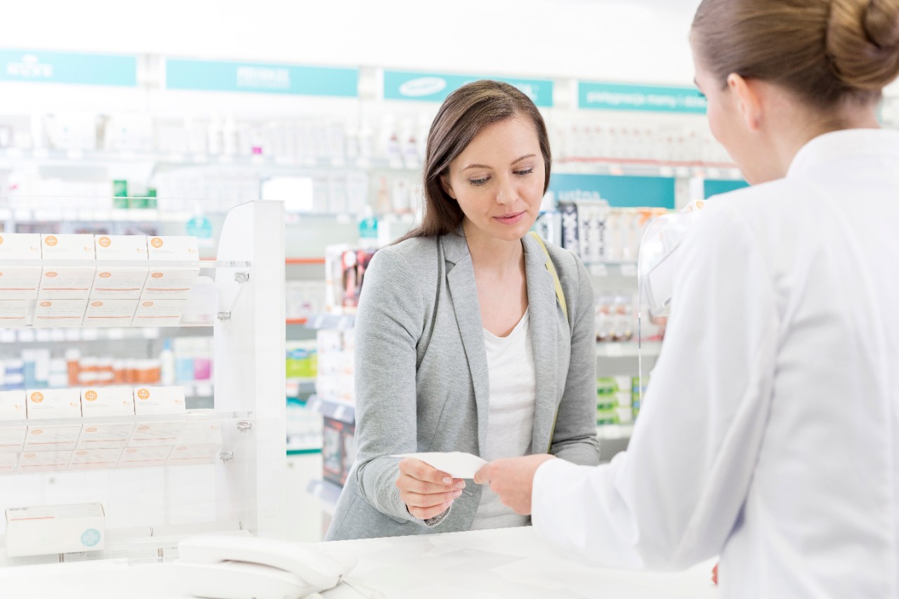 Pharmacist helping a customer