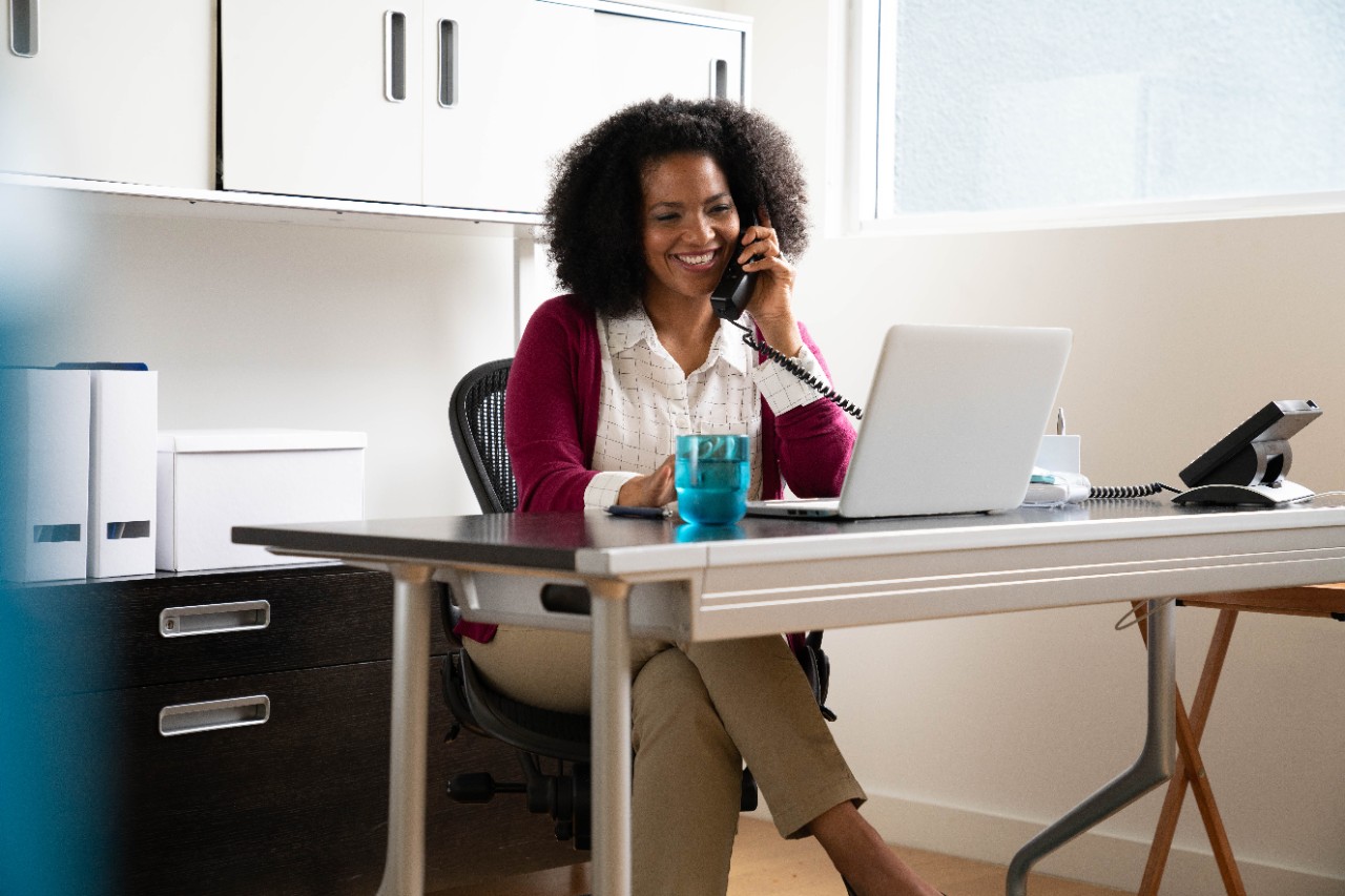 Businesswoman working at desk in office