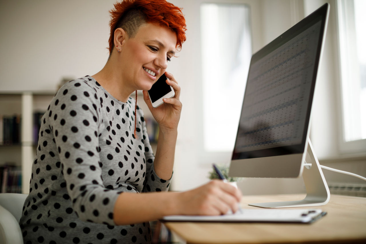 Pregnant woman working from home office